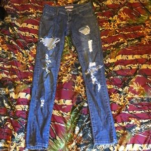 Distressed blue jeans